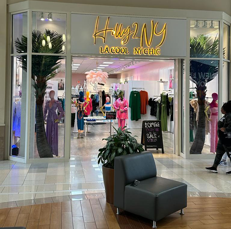 backlit-Channel-letter-holly back lit channel letters storefront sign for clothing store